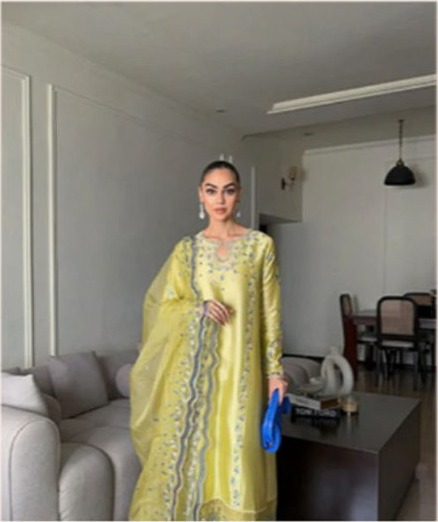 Sarah wearing the Rosalie embroidered lawn set