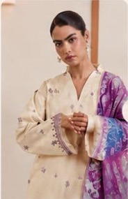 Cream suit with a purple dupatta